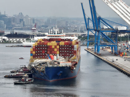 BALTIMORE, MARYLAND - MAY 20: In this aerial view, the damaged container ship Dali is mane