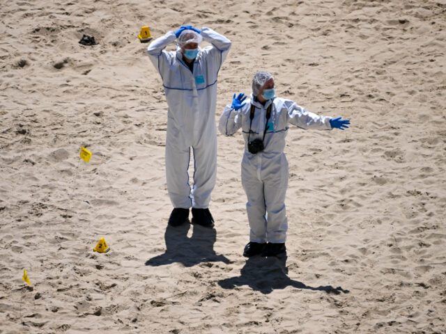 BOURNEMOUTH, ENGLAND - MAY 25: Forensic officers work at the scene of the double stabbing
