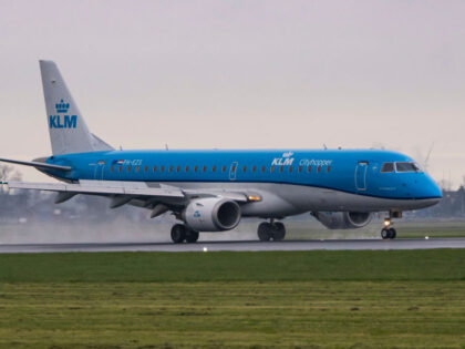 KLM Embraer ERJ 190 passenger aircraft spotted flying, landing and taxiing at Polderbaan r