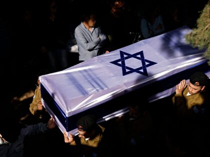 KFAR SABA, ISRAEL - FEBRUARY 26: Soldiers carry the coffin during the funeral for Sgt. Oz
