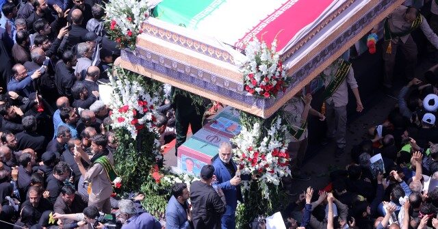 Thousands Chant 'Death to America' at Iran President's Funeral