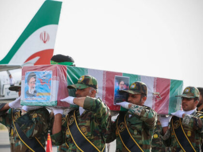 Video Appears to Show Iranian Soldier Ripping Pants While Carrying Coffin of Late Foreign Minister