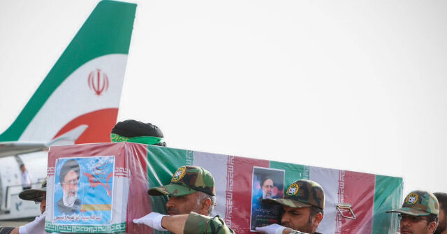 Video Appears to Show Iranian Soldier Ripping Pants While Carrying Coffin of Late Foreign Minister