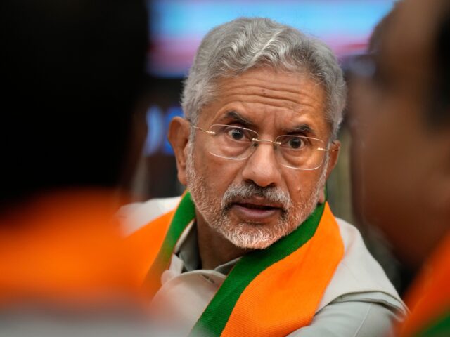 Bharatiya Janata Party (BJP) senior leader and Foreign Minister S. Jaishankar talks to a p