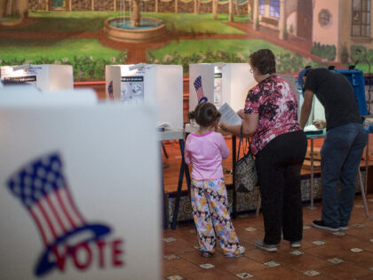 LOS ANGELES, CA - NOVEMBER 08: Latinos vote at a polling station in El Gallo Restaurant on