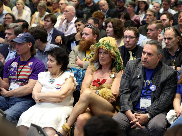 WASHINGTON, DC - MAY 24: Attendees listen as presidential candidate Robert F. Kennedy, Jr.