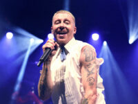 LONDON, ENGLAND - APRIL 12: Macklemore performs on stage at the OVO Arena Wembley during &