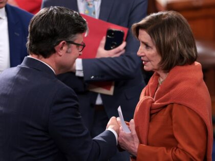 Former U.S. Speaker of the House Nancy Pelosi (D-CA) talks to newly elected Speaker of the