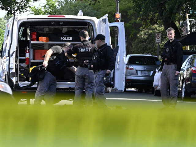 WASHINGTON, USA - MAY 22: Police officers take security measures as the headquarters of th