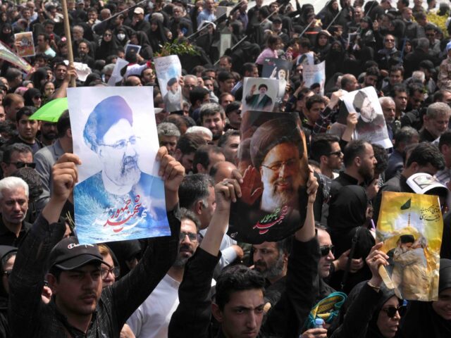 Mourners attend the funeral of Iran's President Ebrahim Raisi at Azadi square in Tehr