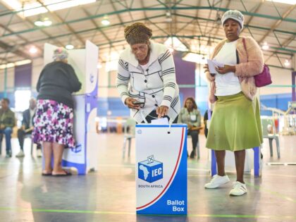 A voter cast her ballot at a polling station in Umlazi on May 29, 2024 during South Africa