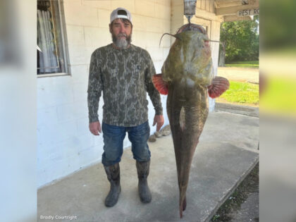 PHOTOS: Man Catches ‘Monster’ Record-Breaking Catfish in Oklahoma Reservoir