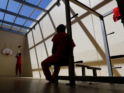 In this Wednesday, Aug. 28, 2019, photo a detainees exercise at the Adelanto ICE Processin