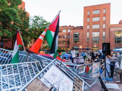 People gather at a pro-Palestinian encampment on the campus of George Washington Universit