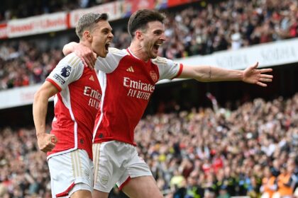 Arsenal's Leandro Trossard (L) and Declan Rice celebrate against Bournemouth