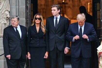 Barron Trump (2nd from right) is seen with his parents and grandfather in Palm Beach, Flor