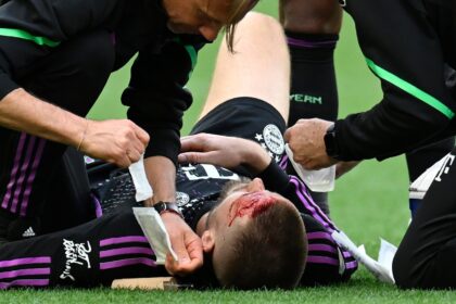 Bayern Munich's Eric Dier had to be treated after a blow to the head during Saturday's def