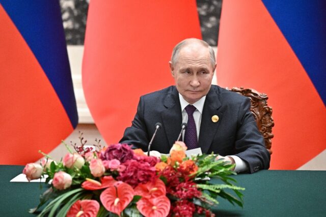 Beijingers on Thursday praised Vladimir Putin's "charisma" and expressed hopes that the co