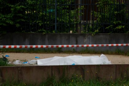 A body covered with a sheet after a double shooting in Sevran, northeast of Paris, on Sund