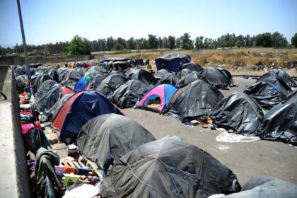 A camp of illegal migrants living rough near the Algerian town of Boufarik