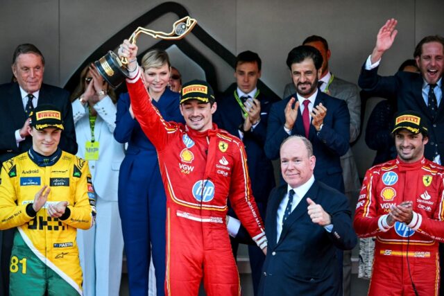 Charles Leclerc celebrates his first home Monaco Grand Prix alongside his Principality's h