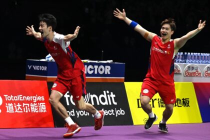 China's Liang Weikeng (right) and Wang Chang celebrate an epic doubles victory against Ind