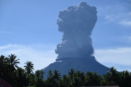 A column of ash soared into the daytime sky on Indonesia's Halmahera island in North Maluk
