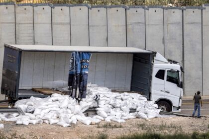 A damaged truck that was carrying humanitarian aid supplies for Gaza after it was vandalis