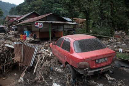 Flash floods and cold lava flow from a volcano hit several districts in western Indonesia