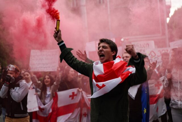 Georgian students stage a march to protest the controversial "foreign influence" bill in T