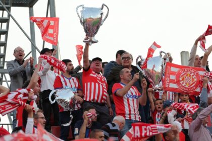 Girona booked their place in next season's Champions League with a 4-2 win over Barcelona