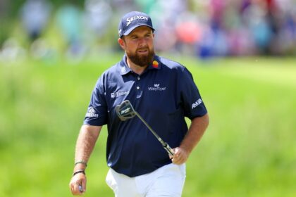 Ireland's Shane Lowry matched the lowest round in major golf history with a 62 in the thir