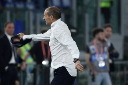Juventus coach Massimiliano Allegri tosses away his tie after seeing red during his side's