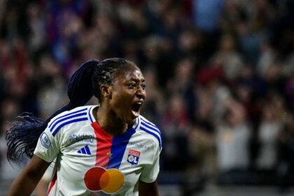 Kadidiatou Diani celebrates after scoring Lyon's second goal in the French season finale a