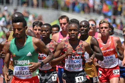 Kenya's Rodgers Kwemoi (C) competes in the men's 10,000m final during the 2022 World Champ