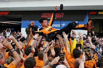 McLaren's Lando Norris is tossed in the air as his team celebrates victory at the Miami Gr