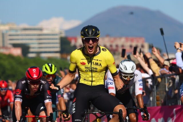 Olav Kooij celebrates as he crosses the finish line in Naples