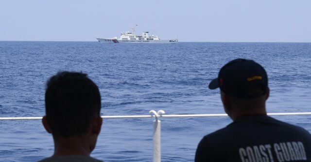 Philippine civilian boat convoy turns back from sail to China-held reef ...
