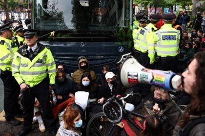 Police were called after the protesters tried to block a bus believed to be taking migrant