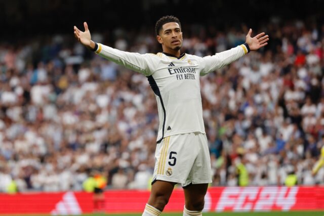 Real Madrid's English midfielder Jude Bellingham celebrates scoring against Cadiz as his t