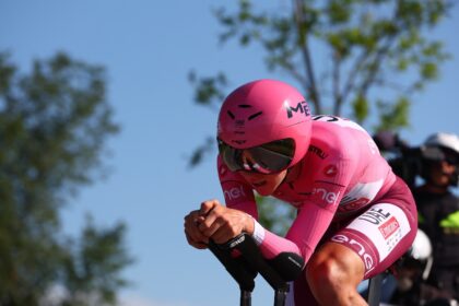 Slovenian rider Tadej Pogacar racing to Lake Garda on stage 14