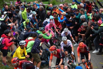 Tadej Pogacar (C) climbs to victory on stage 15 of the Giro