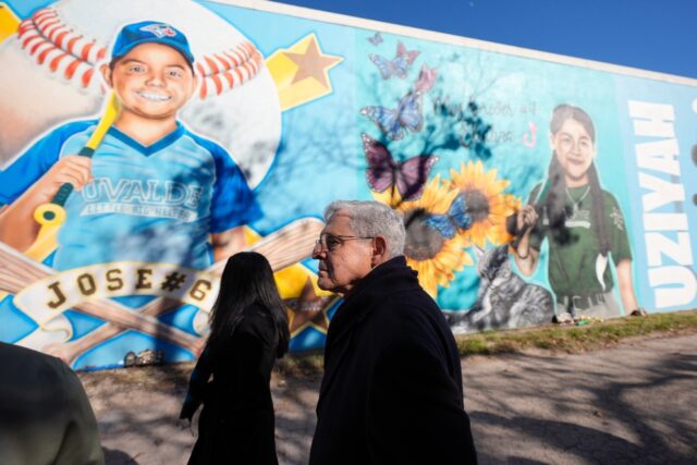 US Attorney General Merrick Garland touring murals of victims of the May 2022 mass shootin