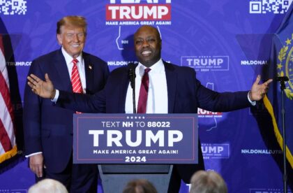 US Senator Tim Scott, pictured (foreground) with former president Donald Trump in January