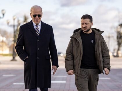 President Joe Biden and Ukrainian President Volodymyr Zelenskyy talk at the Walk of the Br