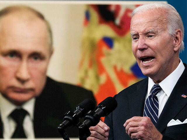 JUNE 22: An image of Russian President Vladimir Putin is displayed as U.S. President Joe B