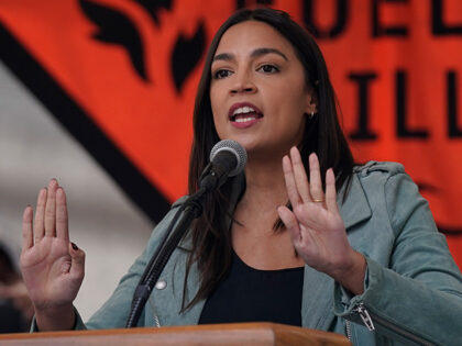 Rep. Alexandria Ocasio-Cortez (D-N.Y) speaks at a rally to end the use of fossil fuels, in
