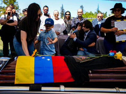 The widow, son, and sister of former Venezuelan dissident military officer Ronald Ojeda, b