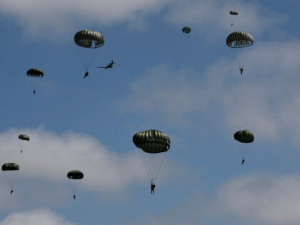 Parachute drop in Carentan-Les-Marais in Normandy, France on Sunday, June 02, 2024, ahead
