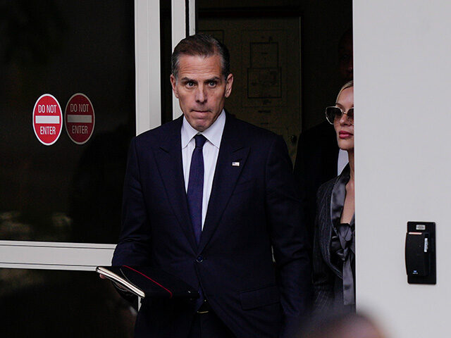 Hunter Biden, left, accompanied by his wife, Melissa Cohen Biden, depart from federal cour